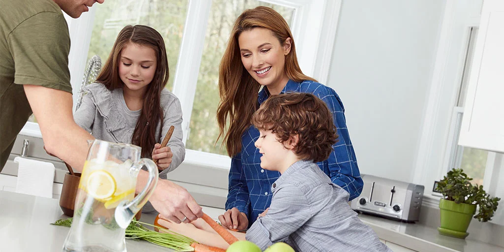 Family at the kitchen island - reverted Family at the kitchen island - reverted